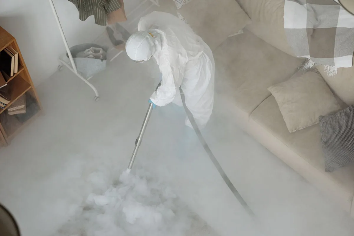 Biohazard cleanup technician in protective equipment, Dublin, VA